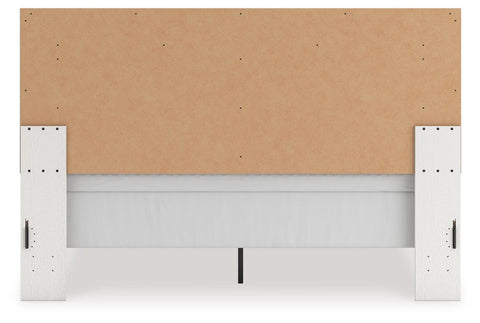 Zuraleus Upholstered Panel Bed, Dresser and Nightstand