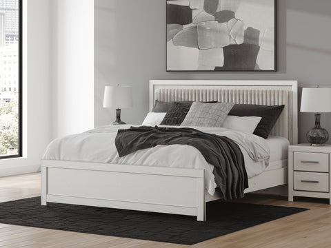 Zuraleus Upholstered Panel Bed, Dresser and Chest