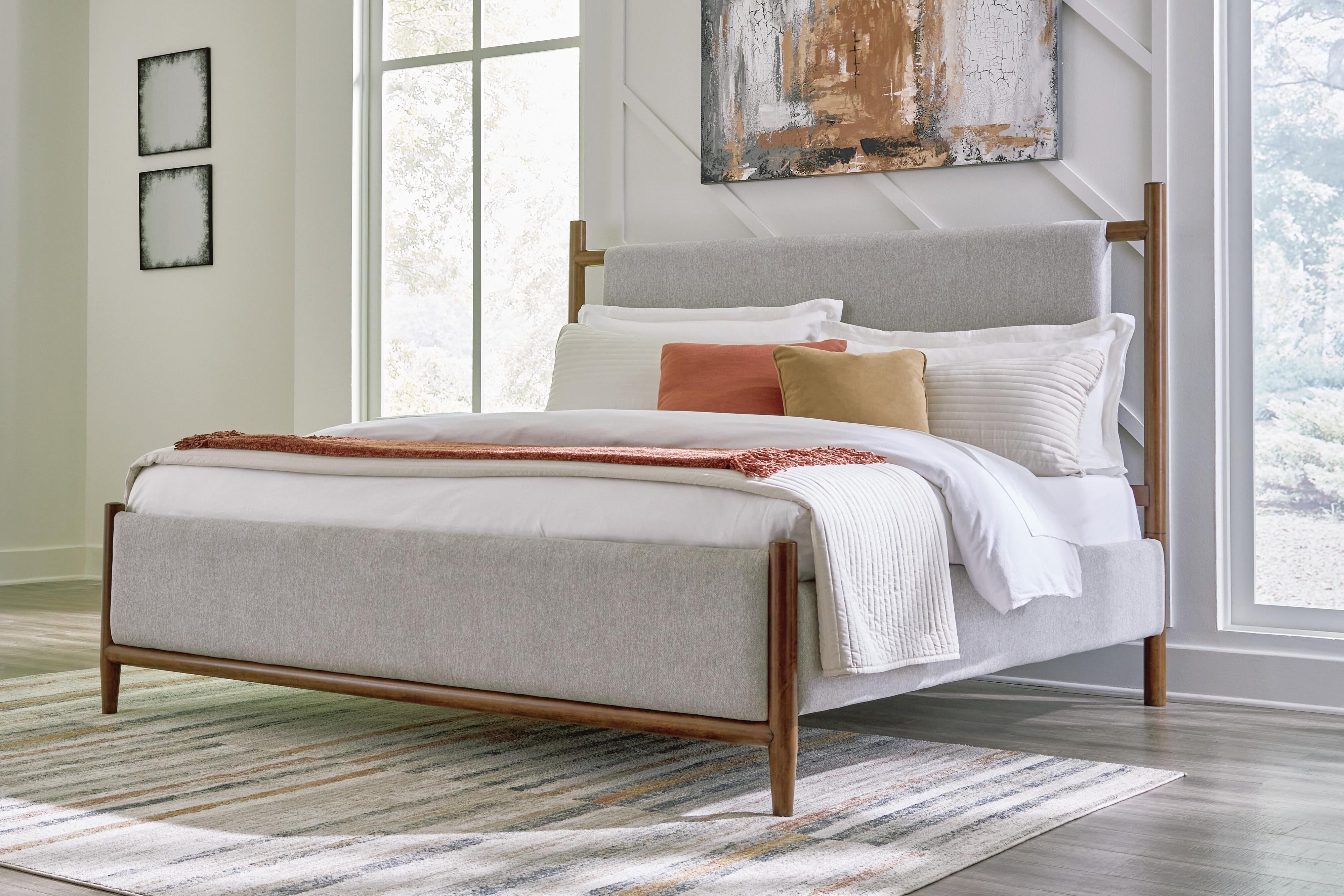 Lyncott Upholstered Panel Bed, Dresser, Mirror and Chest