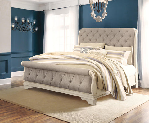 Realyn Sleigh Bed, Dresser Mirror and Nightstand